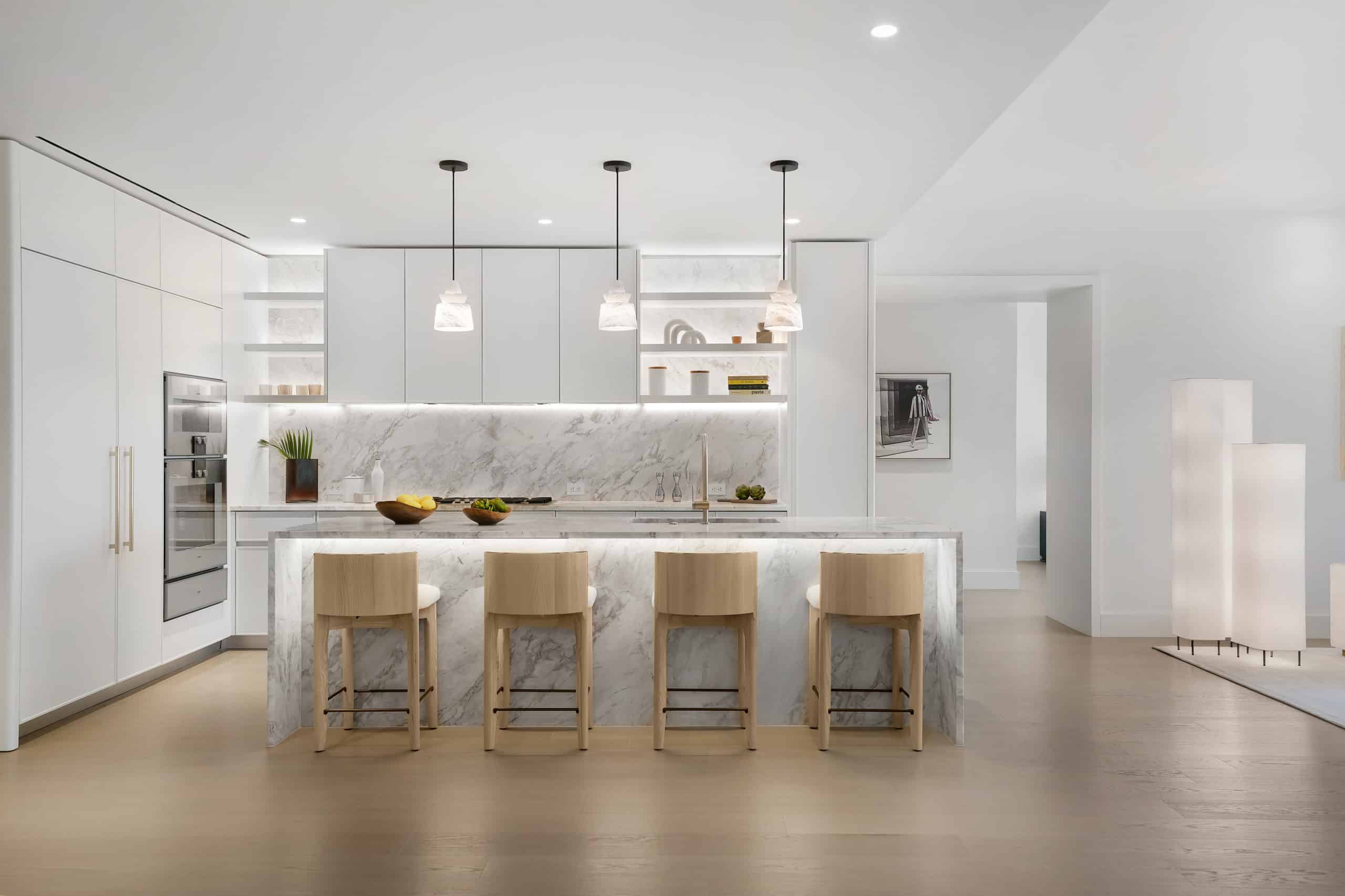 Modern residential kitchen at Olara Residences featuring high-end appliances, sleek cabinetry, and elegant design.