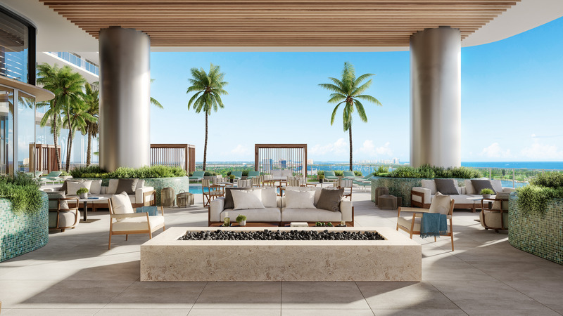 Elegant outdoor lounge at Olara Residences with private cabanas, offering a relaxing waterfront experience.